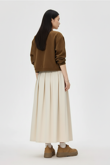 Jupe Midi Crème Plissée Élégante lumineuse